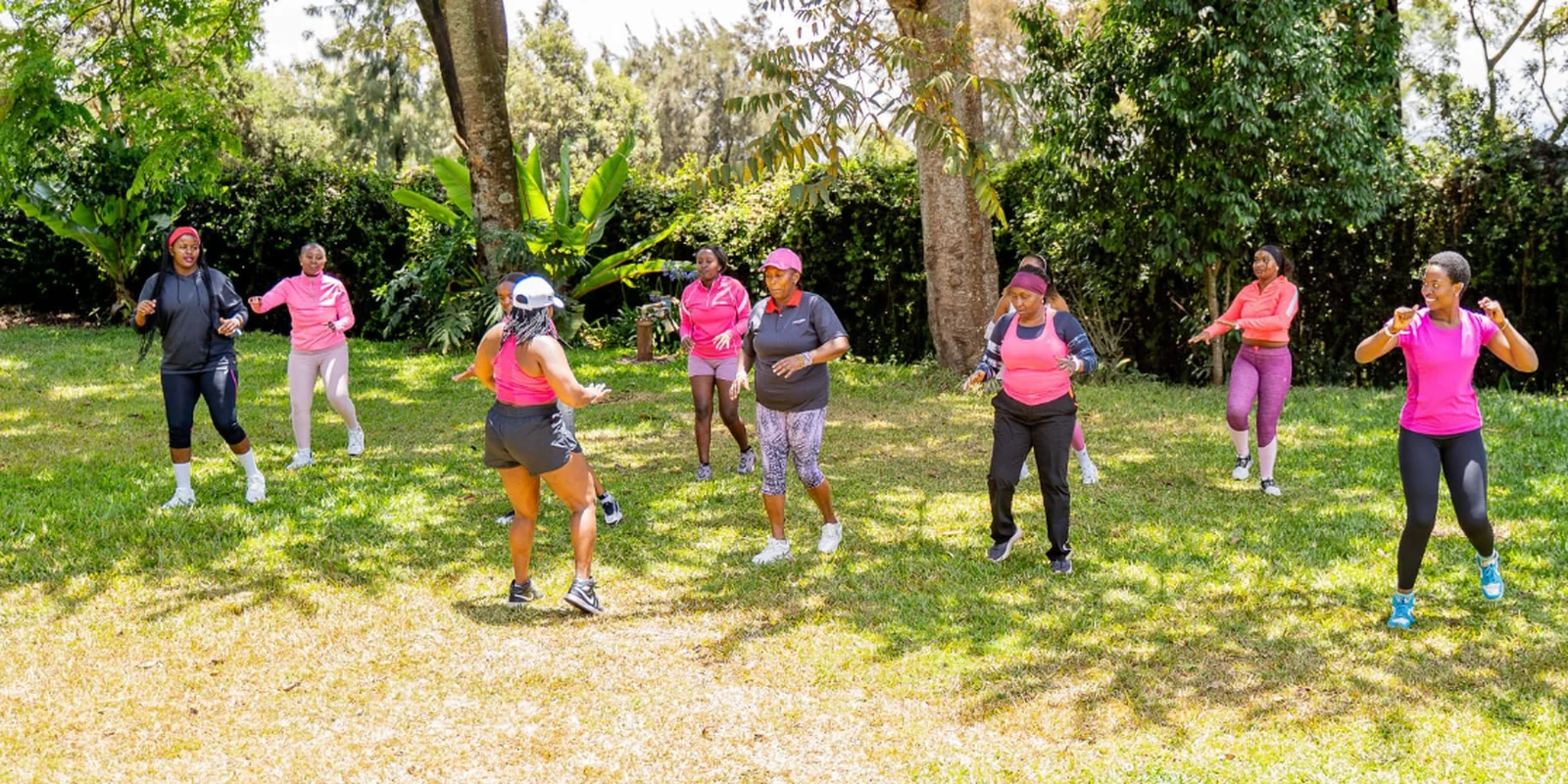 A group of Black women taking part in an outdoor fitness session